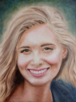 Oil painting of a lovely young woman with flowing blonde hair and a big smile.